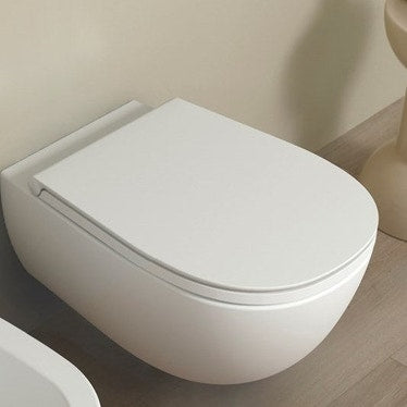 Flaminia Schlanker, umhüllender WC-Sitz aus duroplastischem Material, mit gedämpftem Absenken und Schnelllösescharnieren, Farbe Milchweiß, matte Oberfläche IO . IOCW07LAT